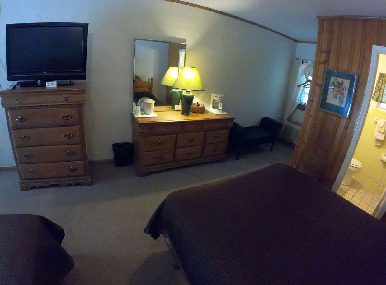 Guest room dresser, mirror and television