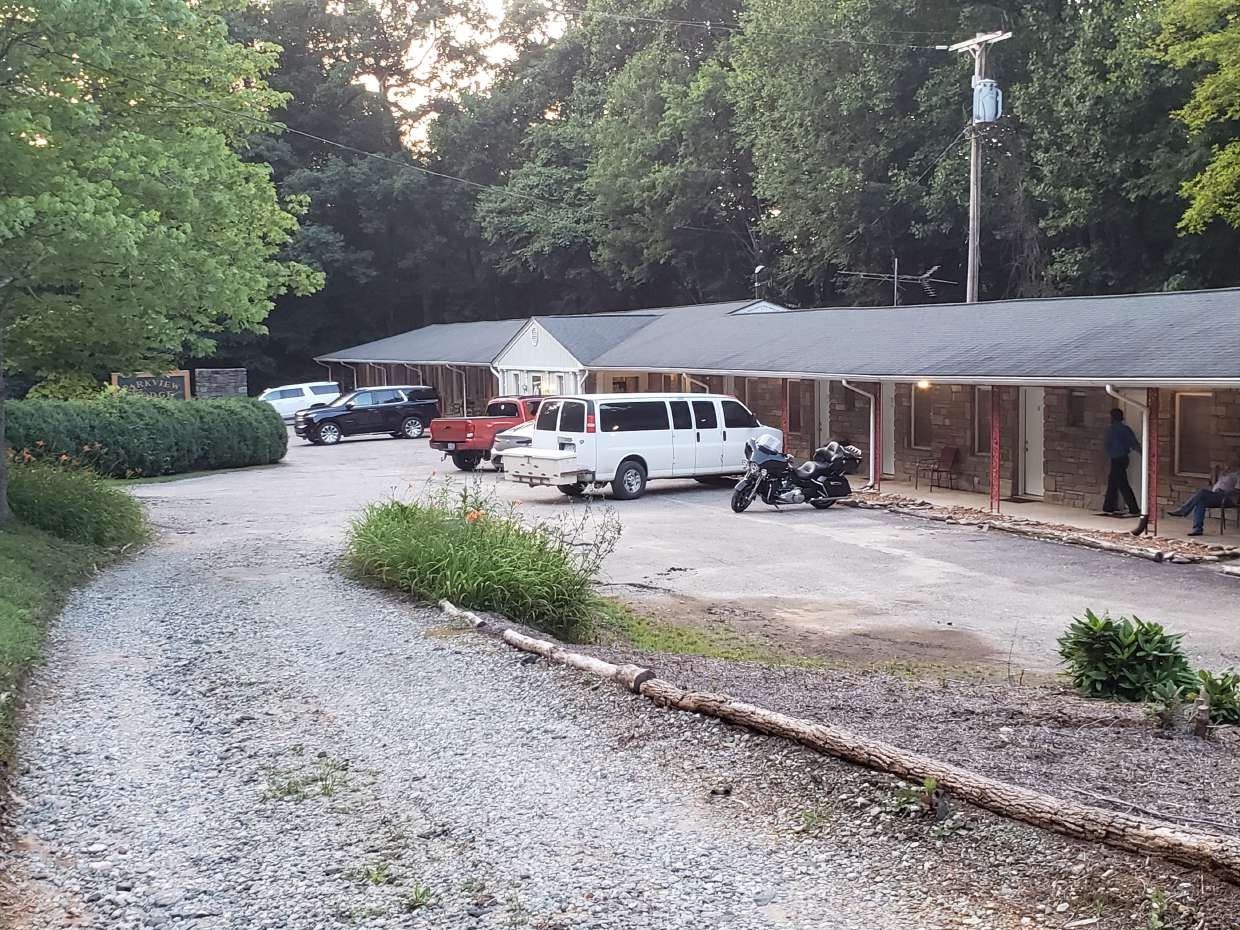 Motel building along the gravel driveway