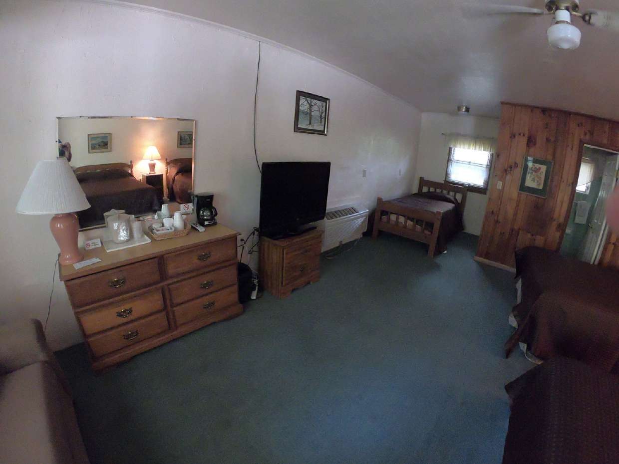 Sitting area with dresser and television