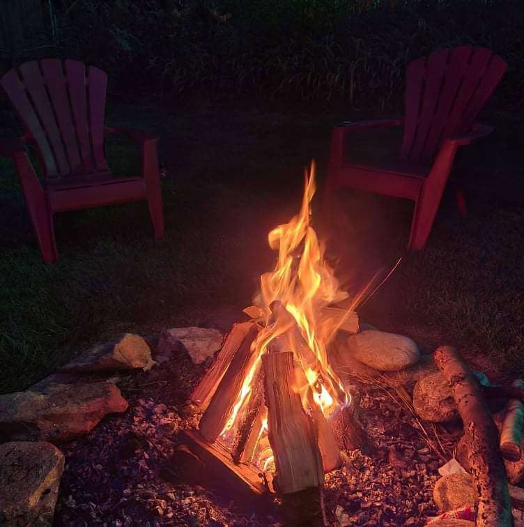 Daytime fire pit with flames